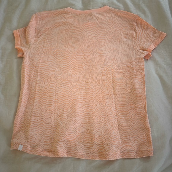 Lululemon athletic shirt. Super cute. Not sold anymore. Orange and white - Picture 2 of 2
